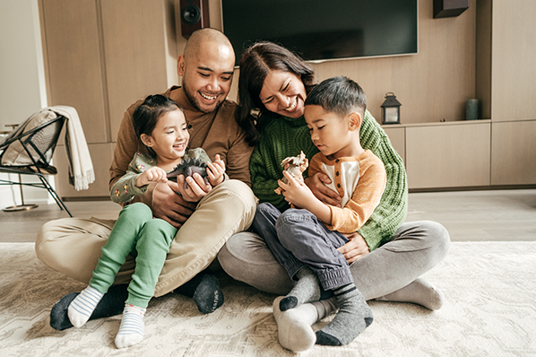 Family sitting in living room